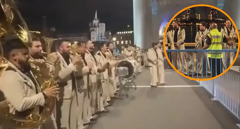 You are currently viewing Banda El Recodo toca cerca del Tower Bridge y un agente interrumpe la presentación